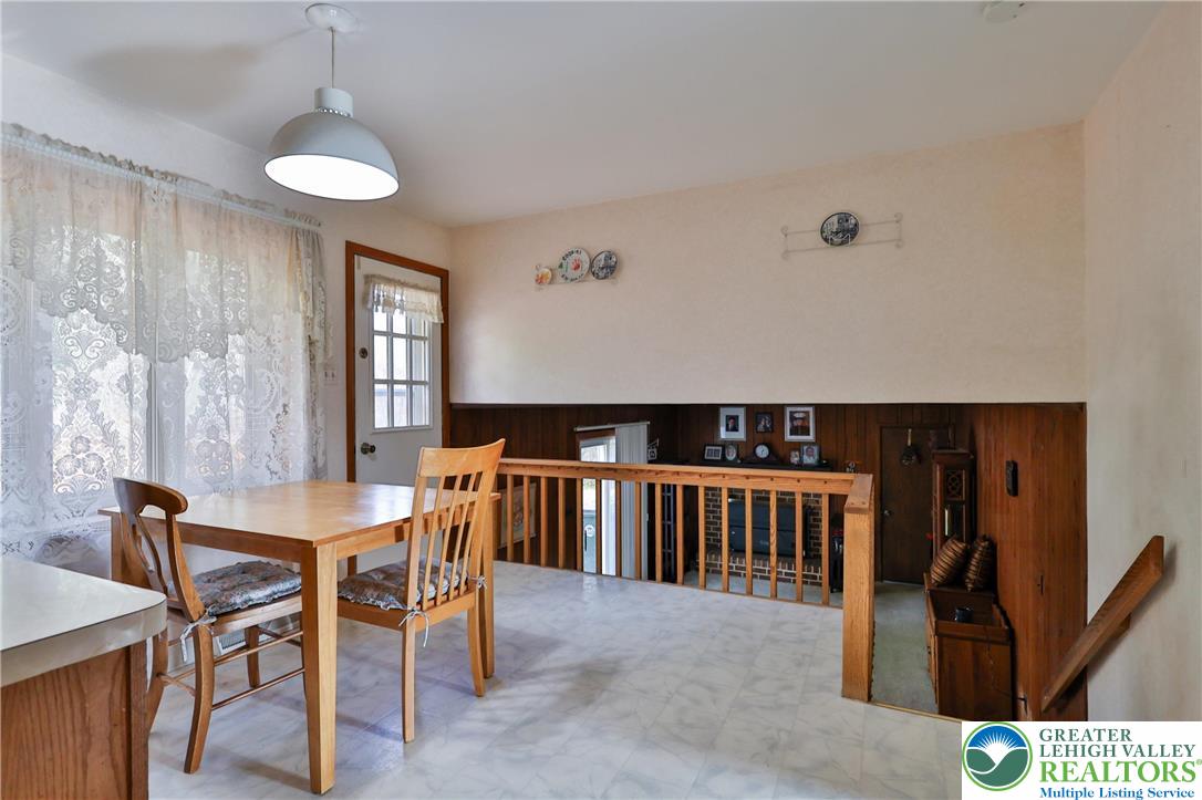 7933 Trails End Fogelsville, PA 18051 - Photo 6 of 32 a view of a dining room with furniture and window
