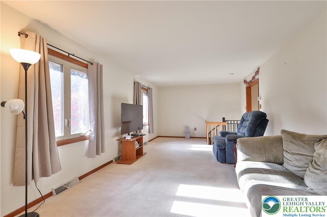 7933 Trails End Fogelsville, PA 18051 - Photo 9 of 32 a living room with furniture and a window