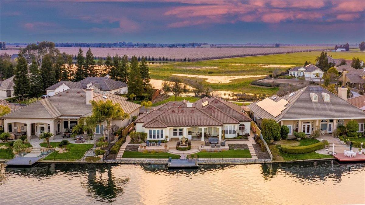 a view of a lake with a building in front of it