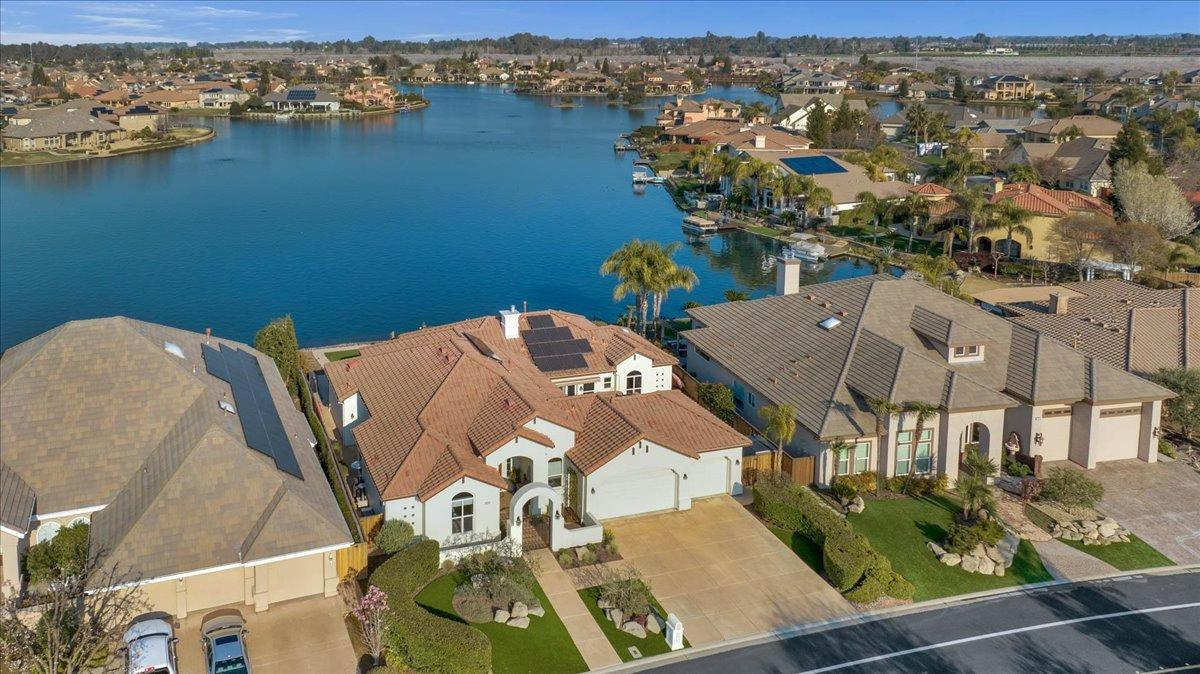 4574 North Quail Lake Drive Clovis, CA 93619 - Photo 4 of 77 an aerial view of a house with outdoor space