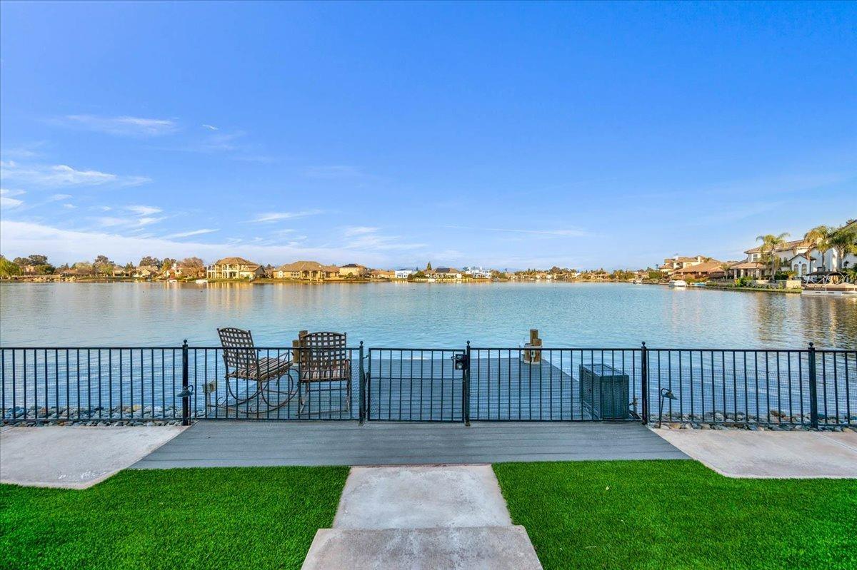 4574 North Quail Lake Drive Clovis, CA 93619 - Photo 52 of 77 a view of a yard with lake and ocean view
