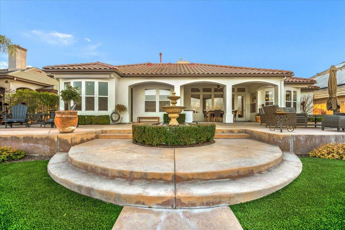 4574 North Quail Lake Drive Clovis, CA 93619 - Photo 55 of 77 a front view of a house with entertaining space