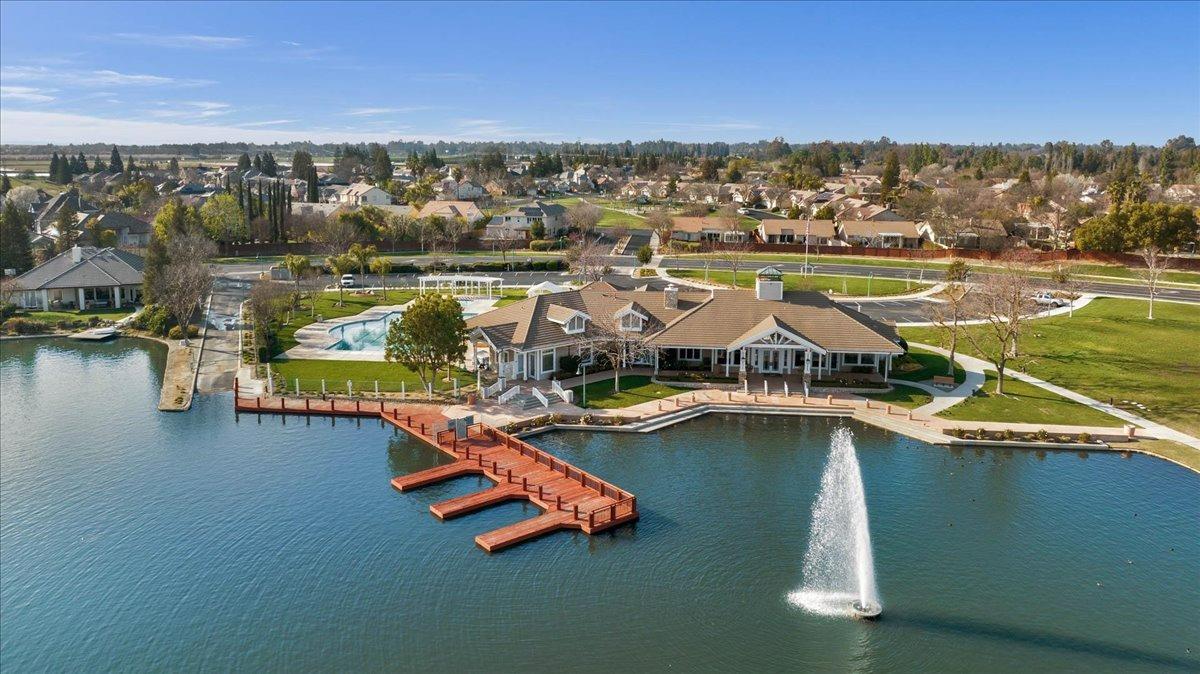 4574 North Quail Lake Drive Clovis, CA 93619 - Photo 67 of 77 an aerial view of residential houses with outdoor space
