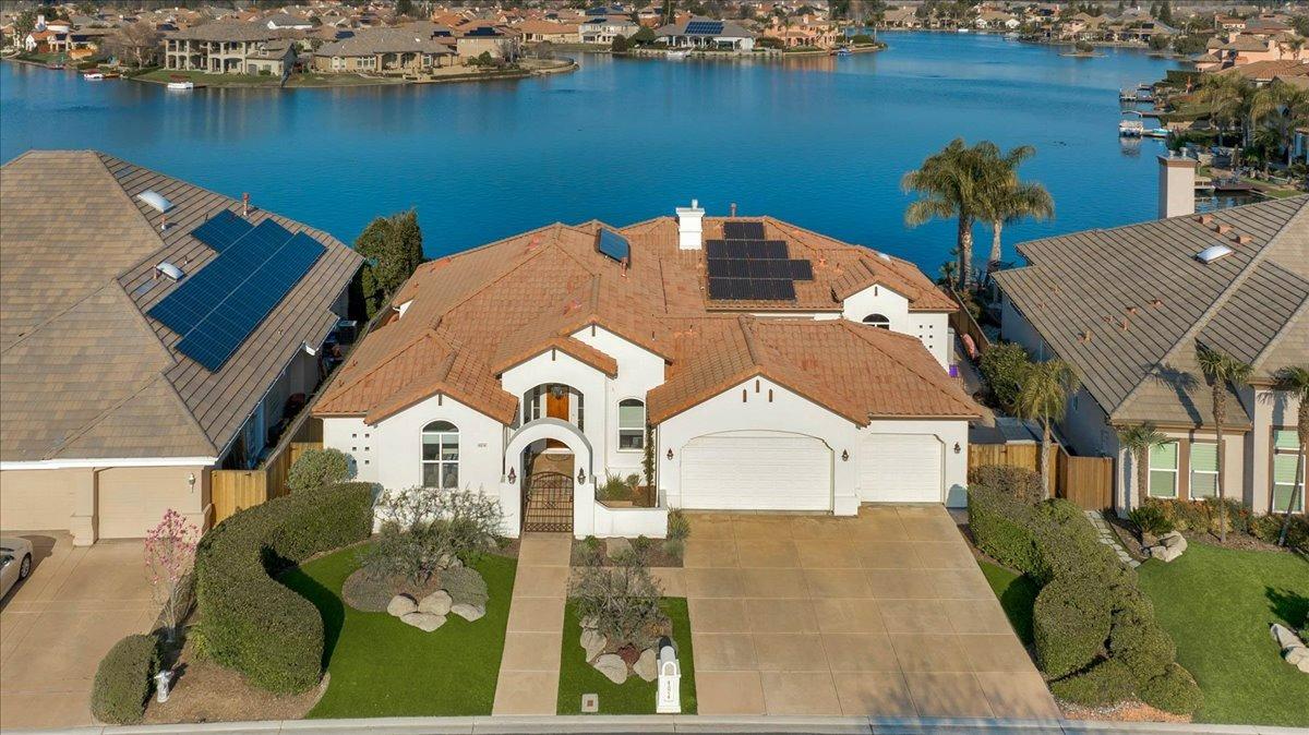 4574 North Quail Lake Drive Clovis, CA 93619 - Photo 77 of 77 an aerial view of a house with outdoor space and lake view