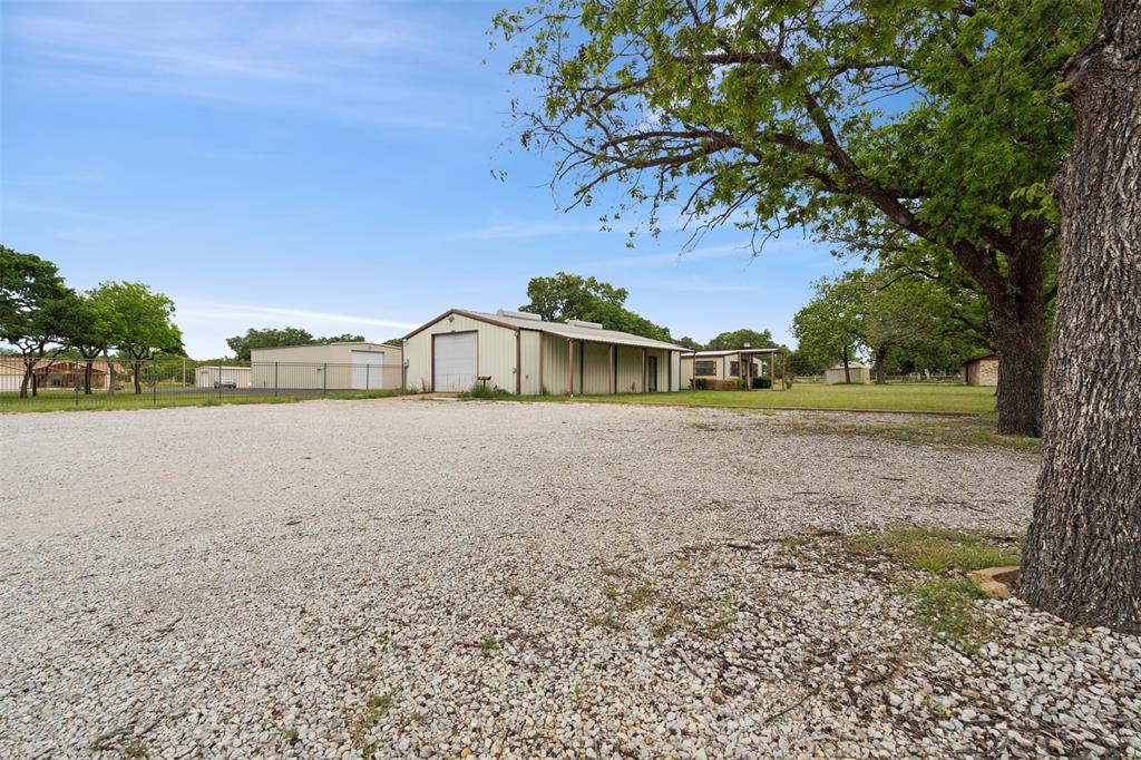 8740 Interstate 20 Eastland, TX 76448 - Photo 11 of 35 a view of a house with a yard