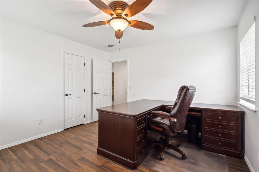 8740 Interstate 20 Eastland, TX 76448 - Photo 12 of 35 a view of a workspace with furniture and a window