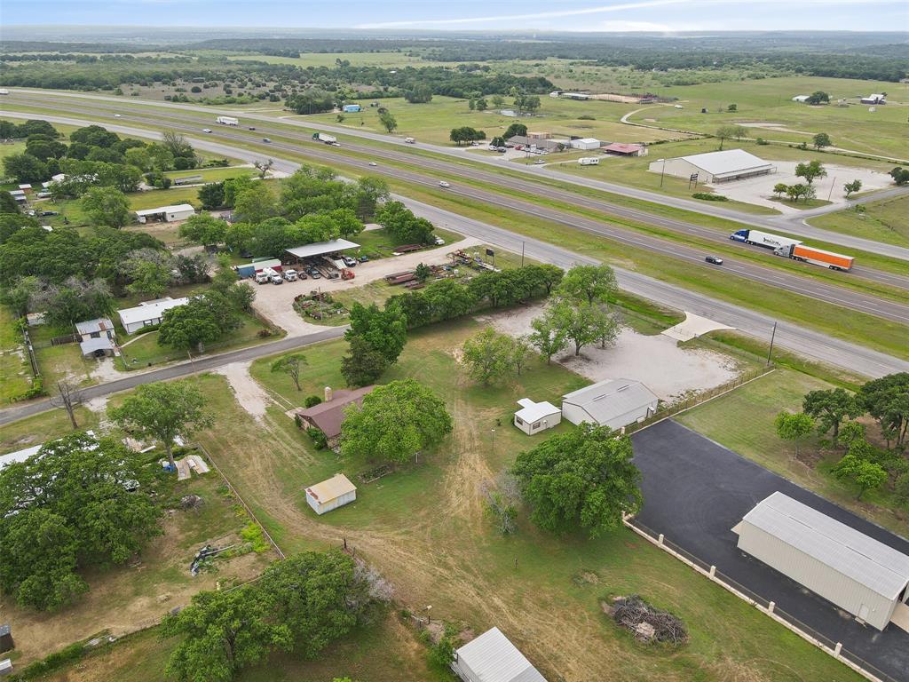 8740 Interstate 20 Eastland, TX 76448 - Photo 17 of 35 an aerial view of ocean with residential houses with outdoor space