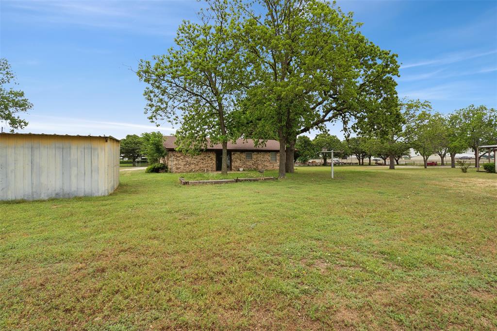 8740 Interstate 20 Eastland, TX 76448 - Photo 32 of 35 a view of a field with an trees