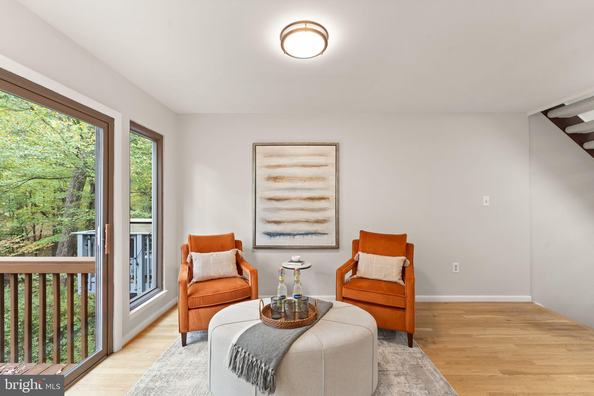 11917 Escalante Court Reston, VA 20191 - Photo 16 of 51 a bedroom with a bed and wooden floor
