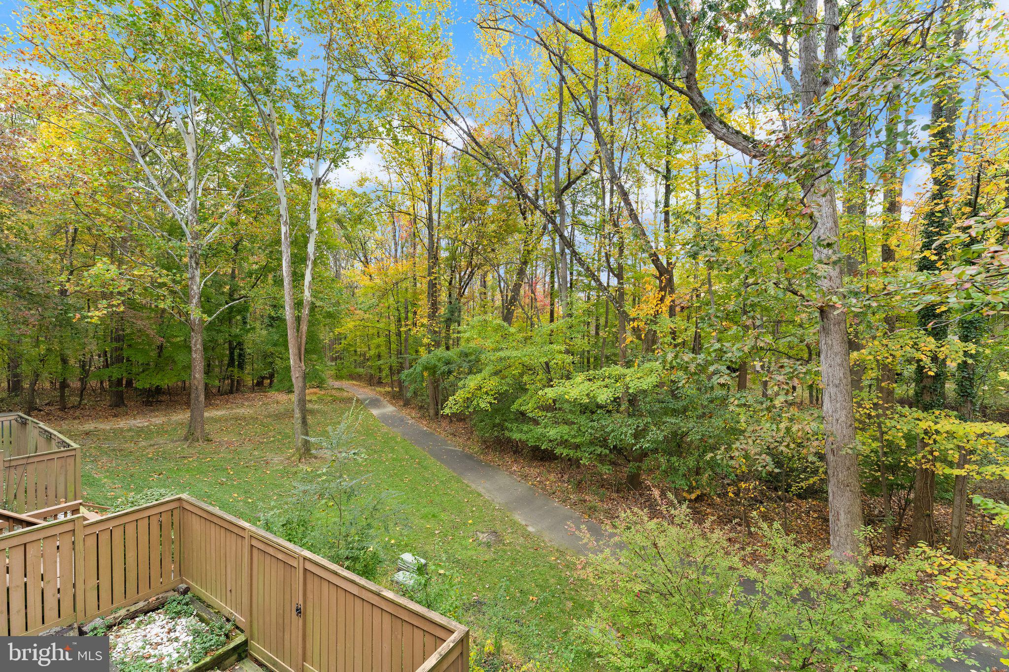 11917 Escalante Court Reston, VA 20191 - Photo 25 of 51 a view of a pathway with a yard