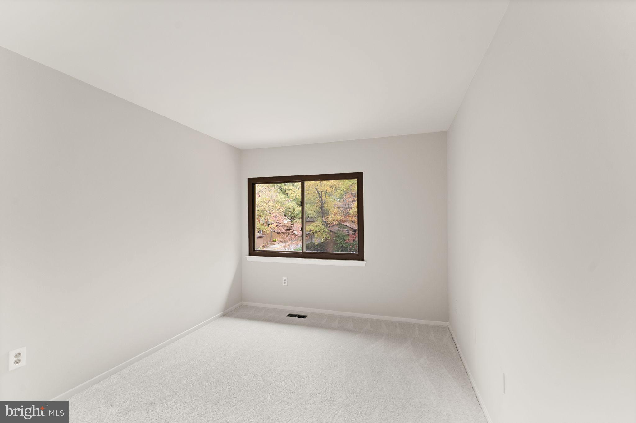 11917 Escalante Court Reston, VA 20191 - Photo 32 of 51 an empty room with a window