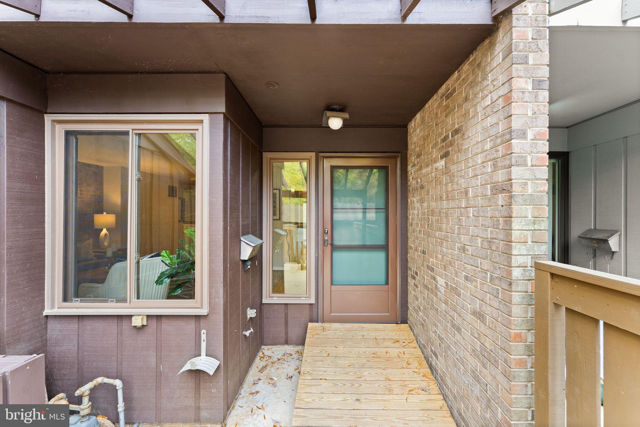 11917 Escalante Court Reston, VA 20191 - Photo 4 of 51 a view of a entryway door front of house