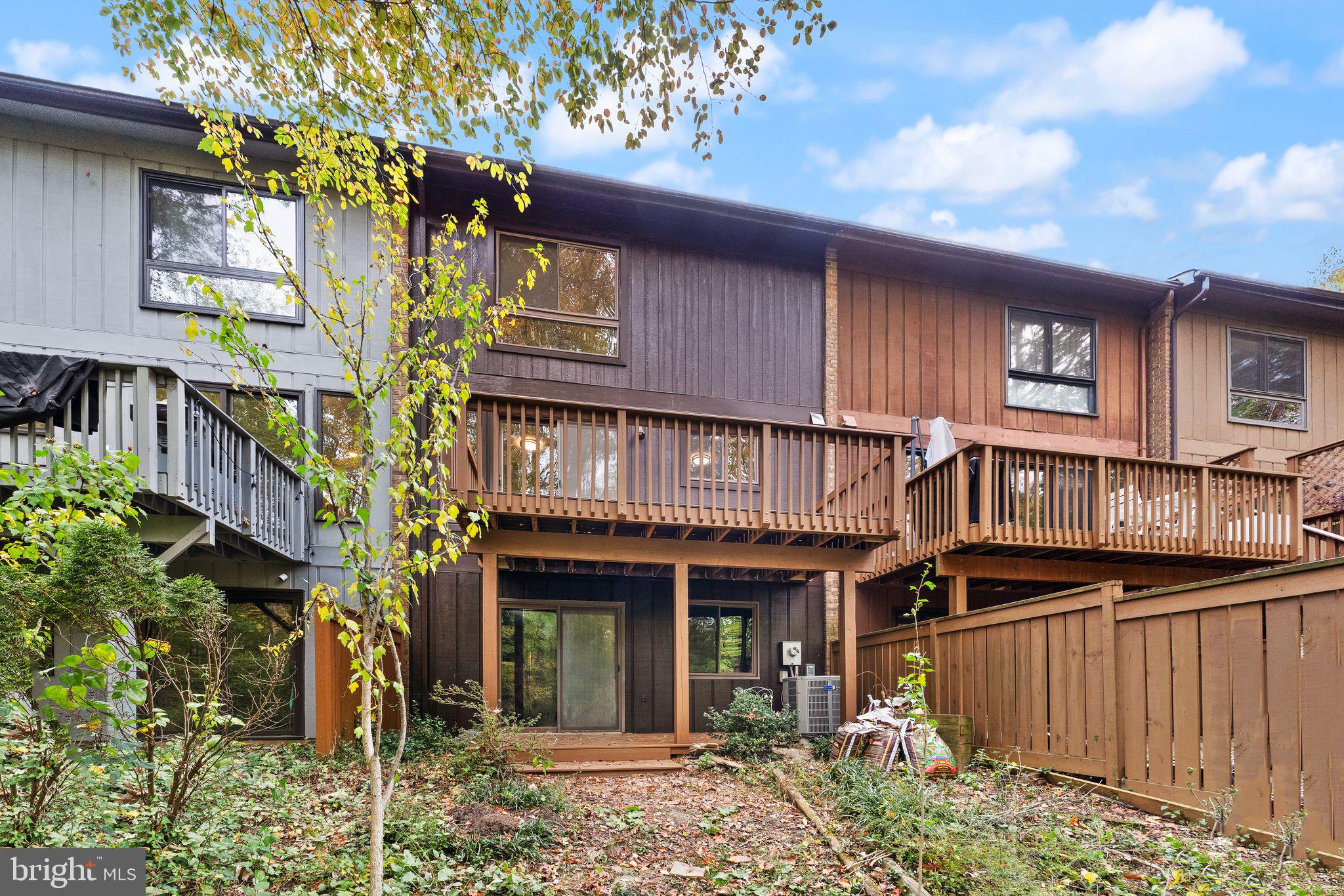 11917 Escalante Court Reston, VA 20191 - Photo 45 of 51 a front view of a house with street