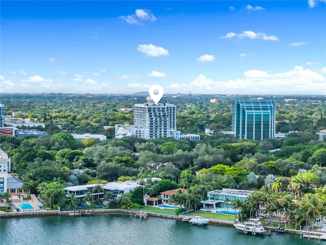 a view of a room with furniture and a potted plant