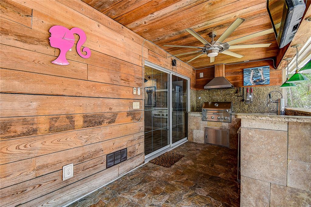 9641 Fulton Avenue Hudson, FL 34667 - Photo 29 of 60 a view of storage and utility room