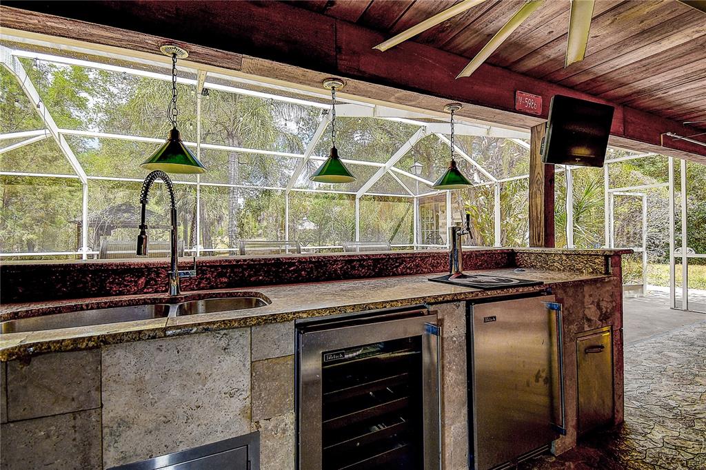 9641 Fulton Avenue Hudson, FL 34667 - Photo 32 of 60 a kitchen with a sink and a window