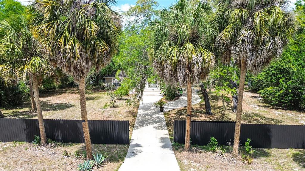 9641 Fulton Avenue Hudson, FL 34667 - Photo 57 of 60 a view of a backyard of the house