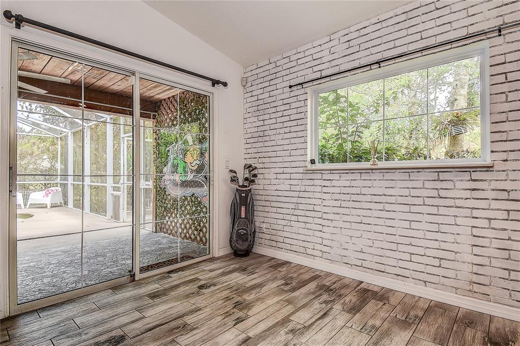 9641 Fulton Avenue Hudson, FL 34667 - Photo 9 of 60 a view of a room with a large window