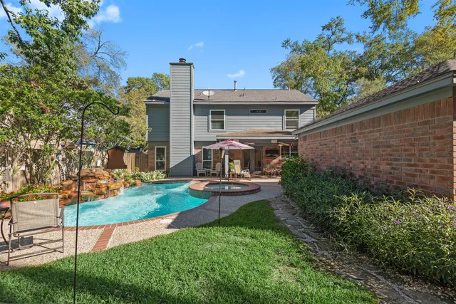 aerial view of a house with garden