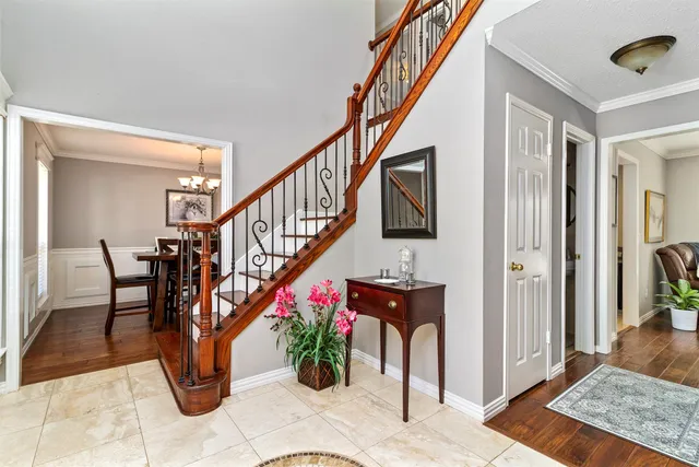 a view of entryway dining room and hall
