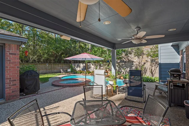 a outdoor space with patio the couches and pool table with chairs