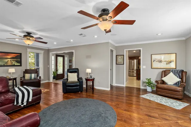 a living room with furniture or couch and a flat screen tv