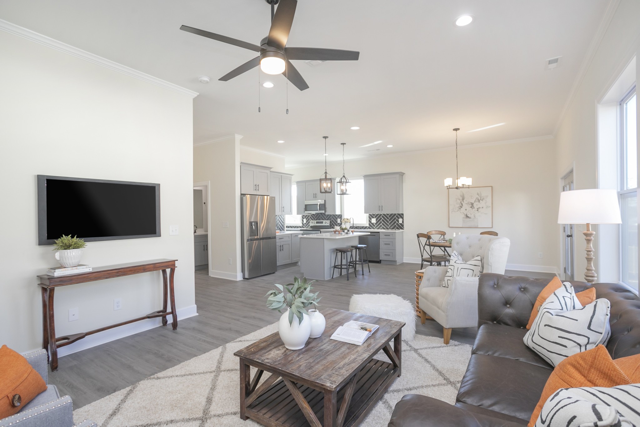 4344 Old Goins Road Nashville, TN 37211 - Photo 5 of 29 a living room with furniture a flat screen tv and kitchen view