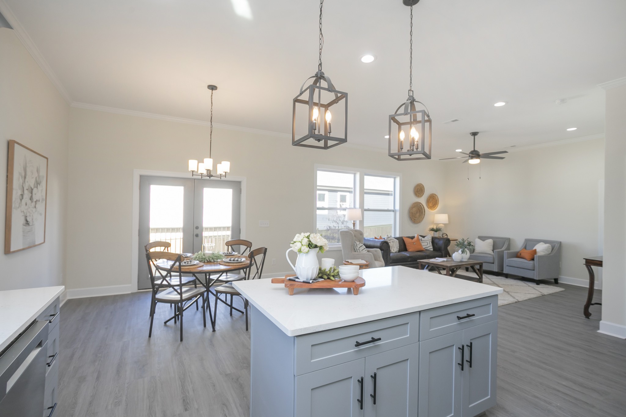 4344 Old Goins Road Nashville, TN 37211 - Photo 9 of 29 a kitchen with a sink dishwasher a dining table and chairs with wooden floor