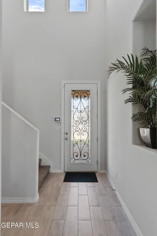 a bathroom with a sink toilet and mirror