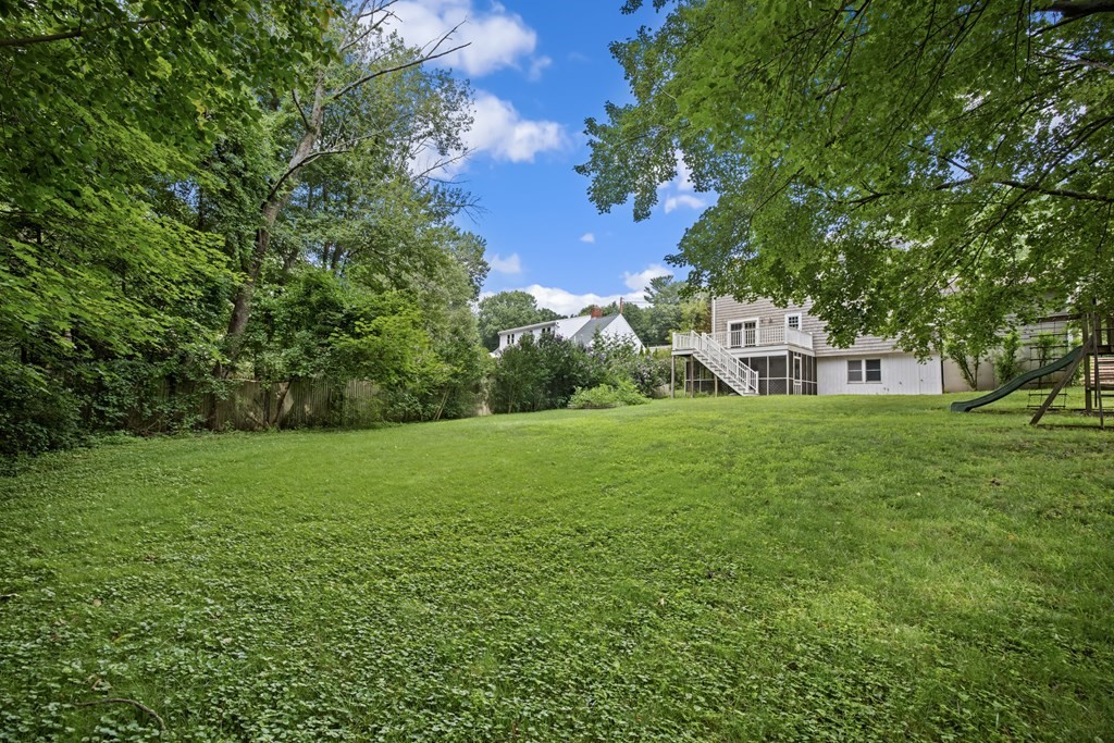 58 Oak Street Reading, MA 01867 - Photo 34 of 40 a view of house with backyard