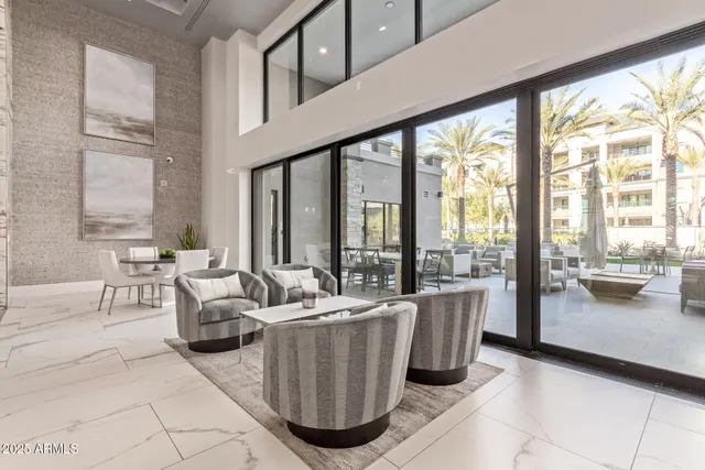 a outdoor space with lots of chairs and mirrors