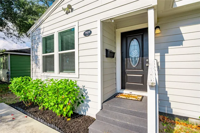 a view of entrance gate of the house