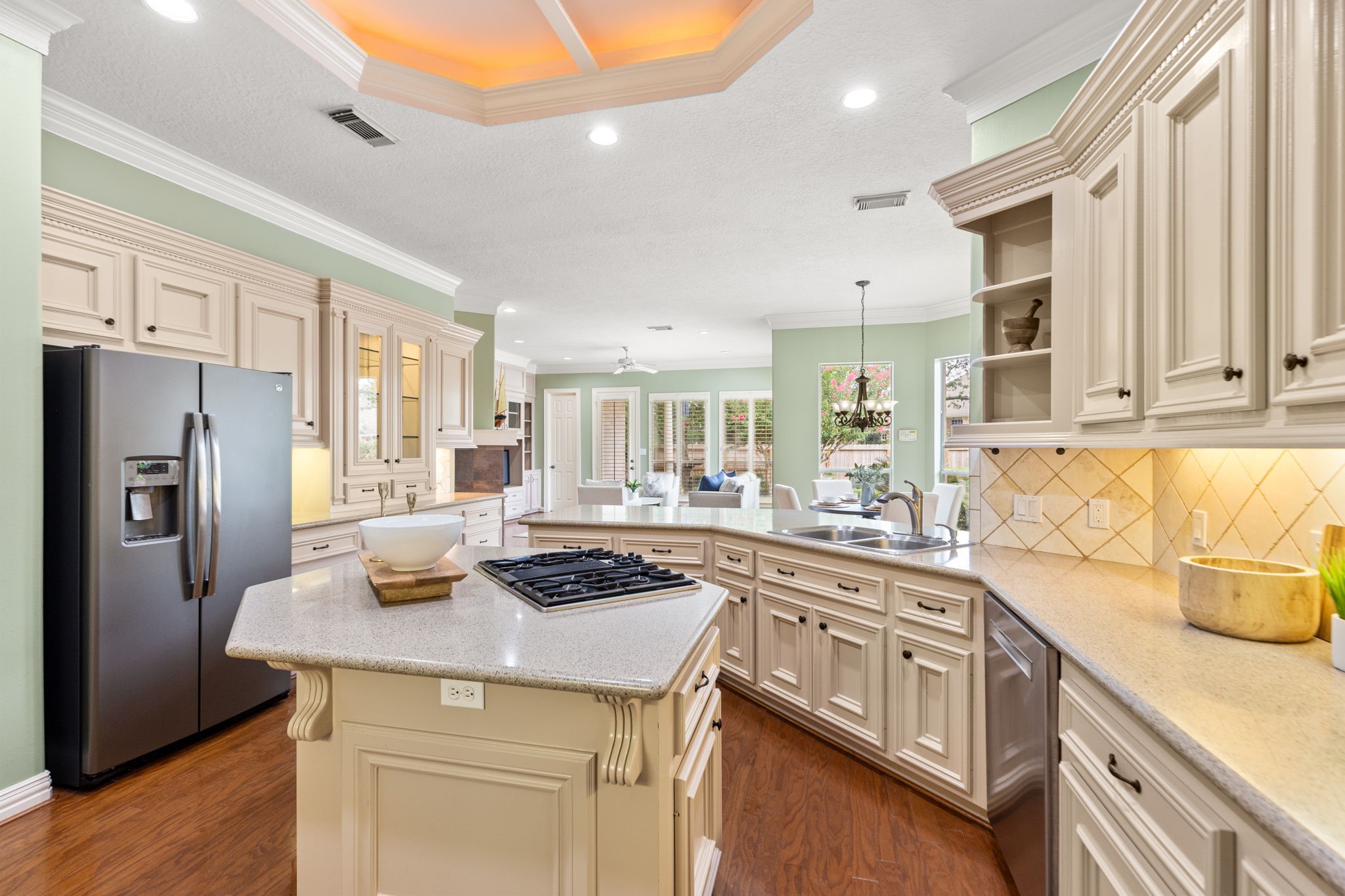 6610 Radley Drive Spring, TX 77379 - Photo 14 of 50 View from kitchen into breakfast & Family rooms.