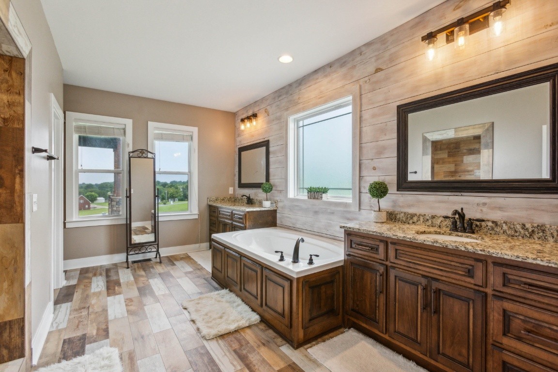 215 George Akins Road Westmoreland, TN 37186 - Photo 23 of 39 a living room with stainless steel appliances granite countertop a sink and dishwasher with a large kitchen island