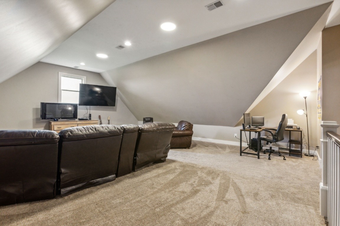 215 George Akins Road Westmoreland, TN 37186 - Photo 34 of 39 a living room with furniture and a flat screen tv