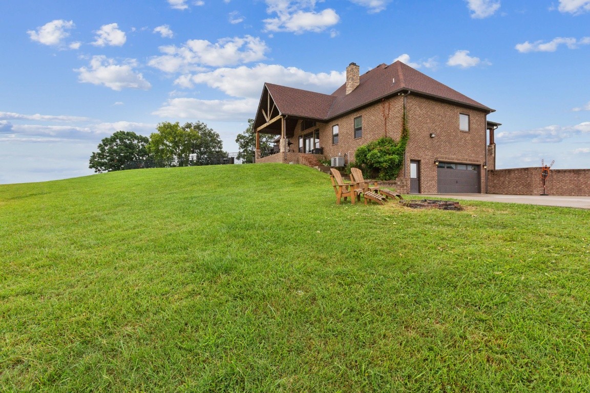 215 George Akins Road Westmoreland, TN 37186 - Photo 5 of 39 a view of a house with a yard
