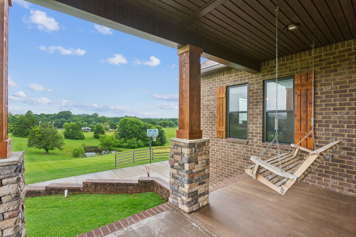 215 George Akins Road Westmoreland, TN 37186 - Photo 7 of 39 a front view of a house with garden