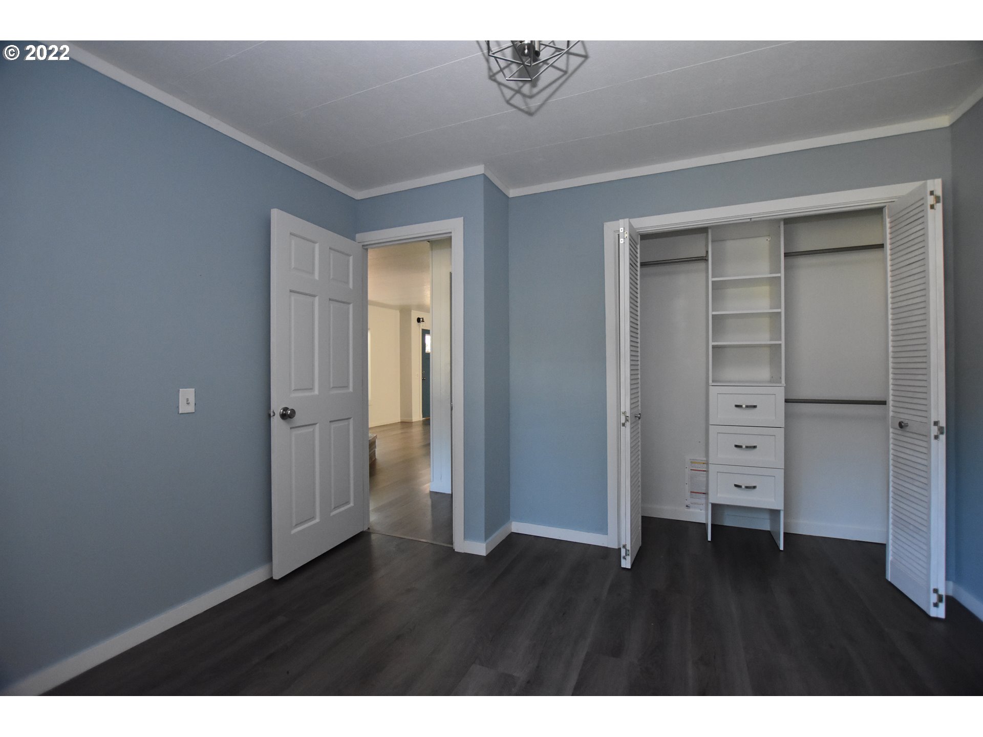 1629 Harbor Drive Springfield, OR 97477 - Photo 16 of 32 a view of an empty room with wooden floor