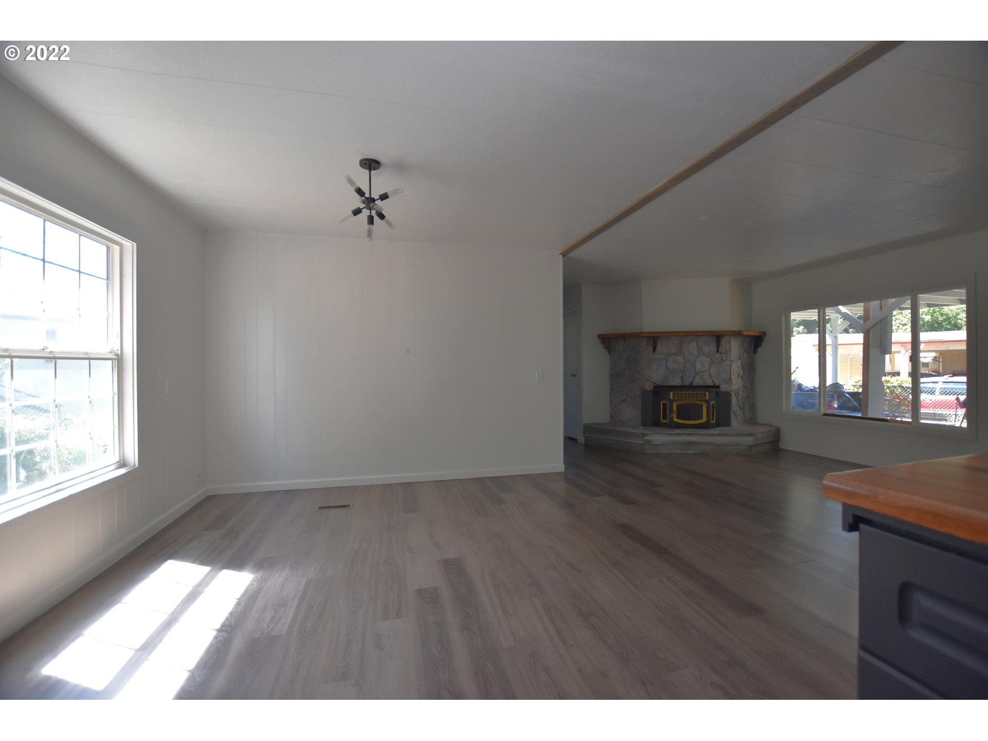 1629 Harbor Drive Springfield, OR 97477 - Photo 9 of 32 a view of empty room with wooden floor and fan