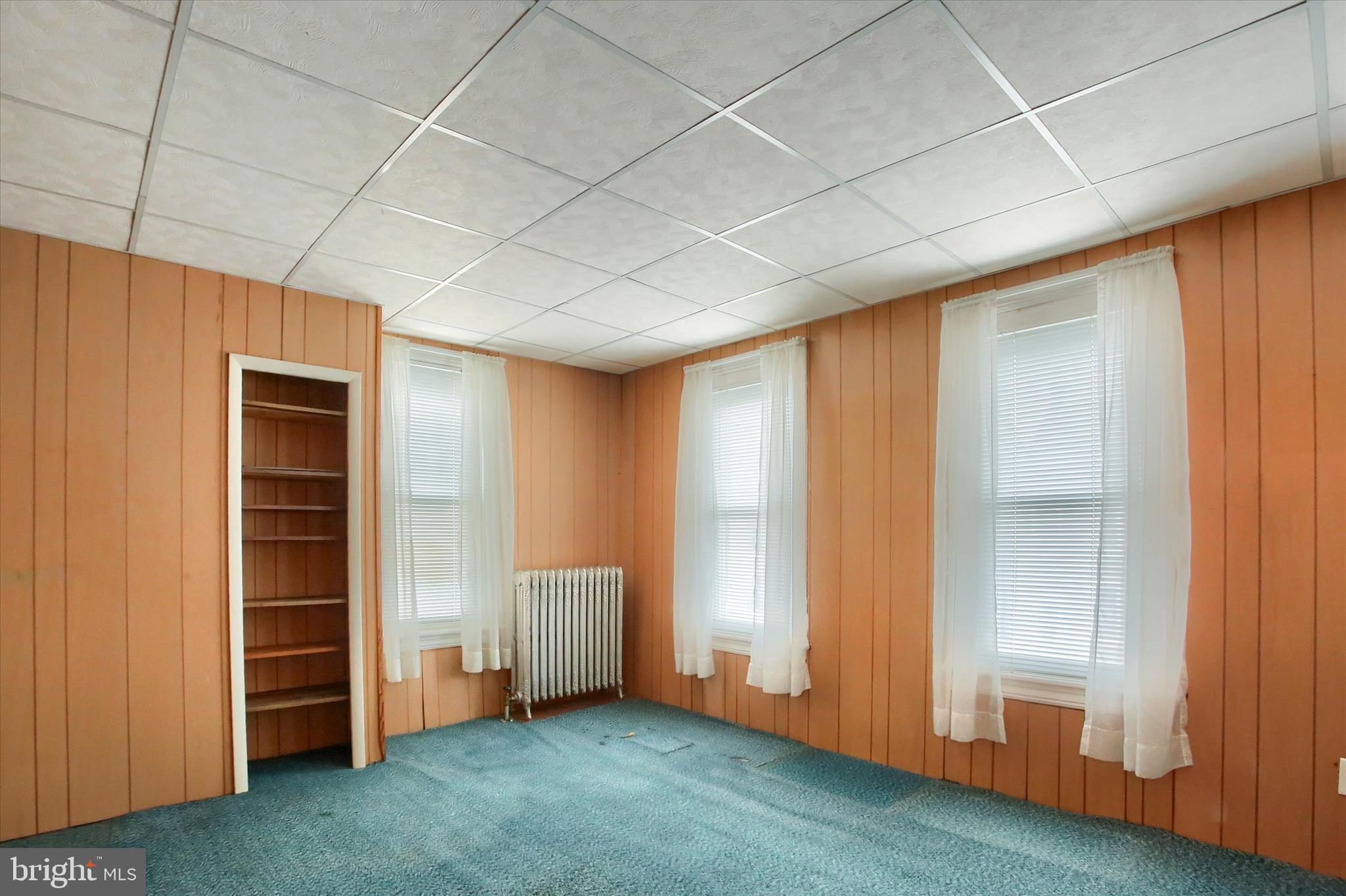 636 Walnut Street Lebanon, PA 17042 - Photo 23 of 33 a view of an empty room with closet and wooden door