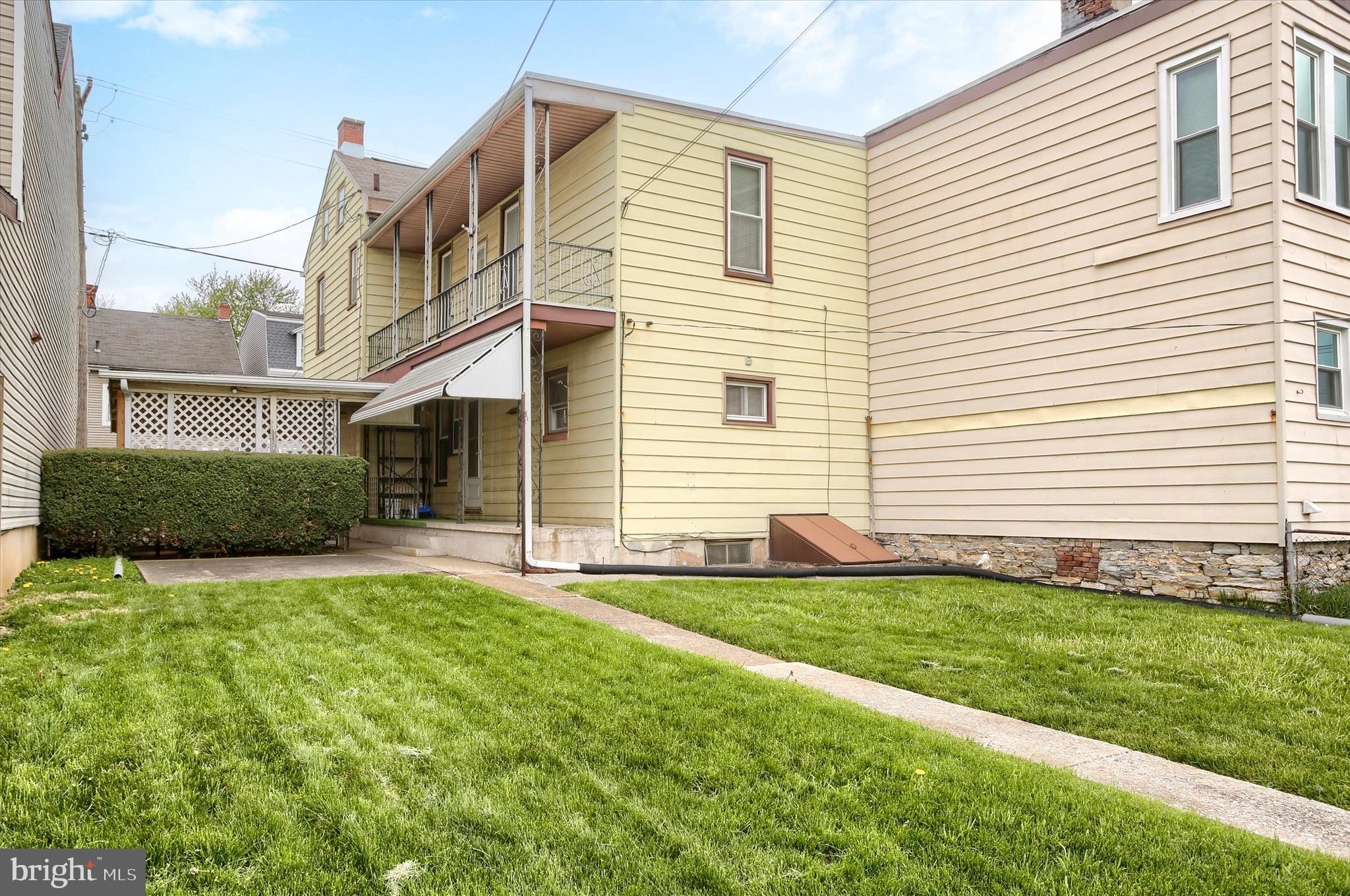 636 Walnut Street Lebanon, PA 17042 - Photo 31 of 33 a front view of a house with a yard