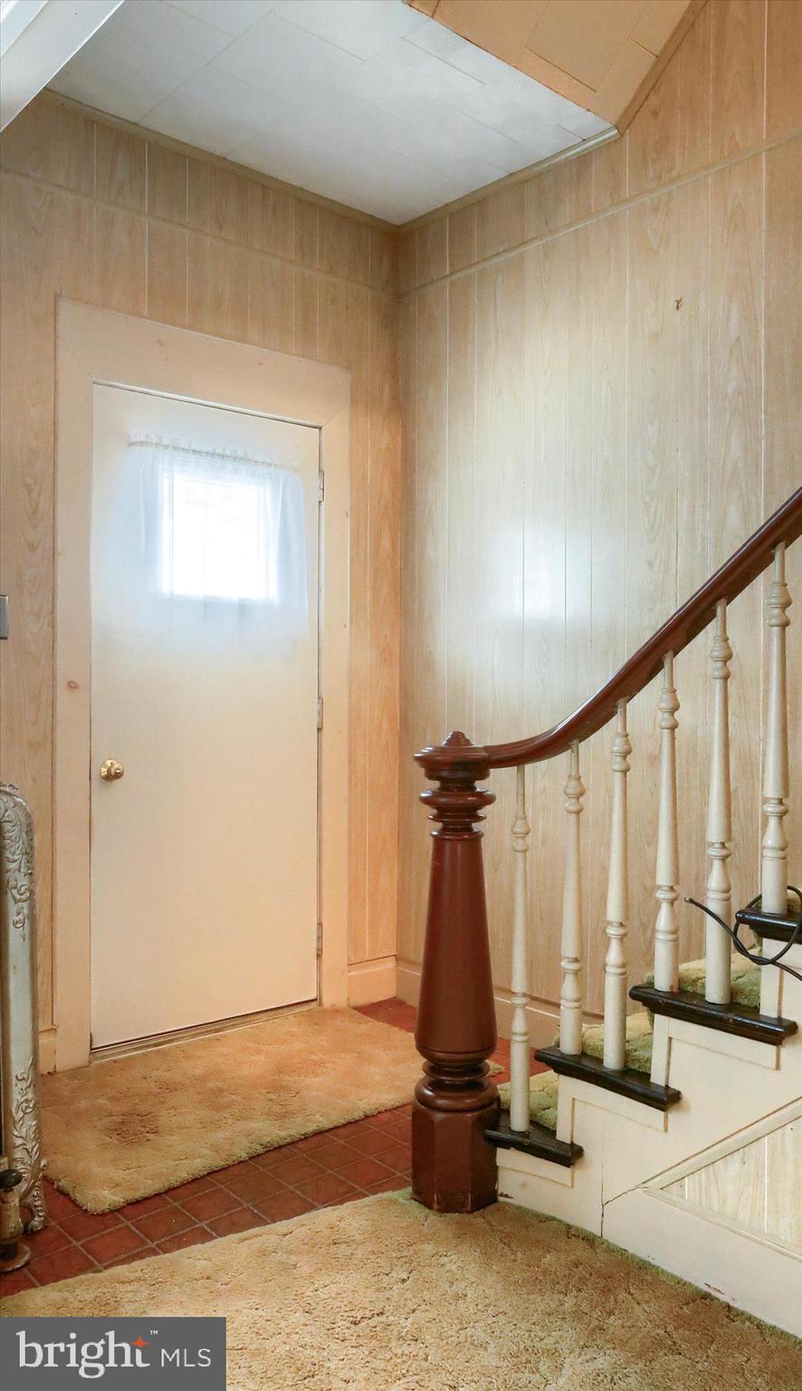 636 Walnut Street Lebanon, PA 17042 - Photo 6 of 33 a view of empty room with floor to ceiling window and ceiling fan
