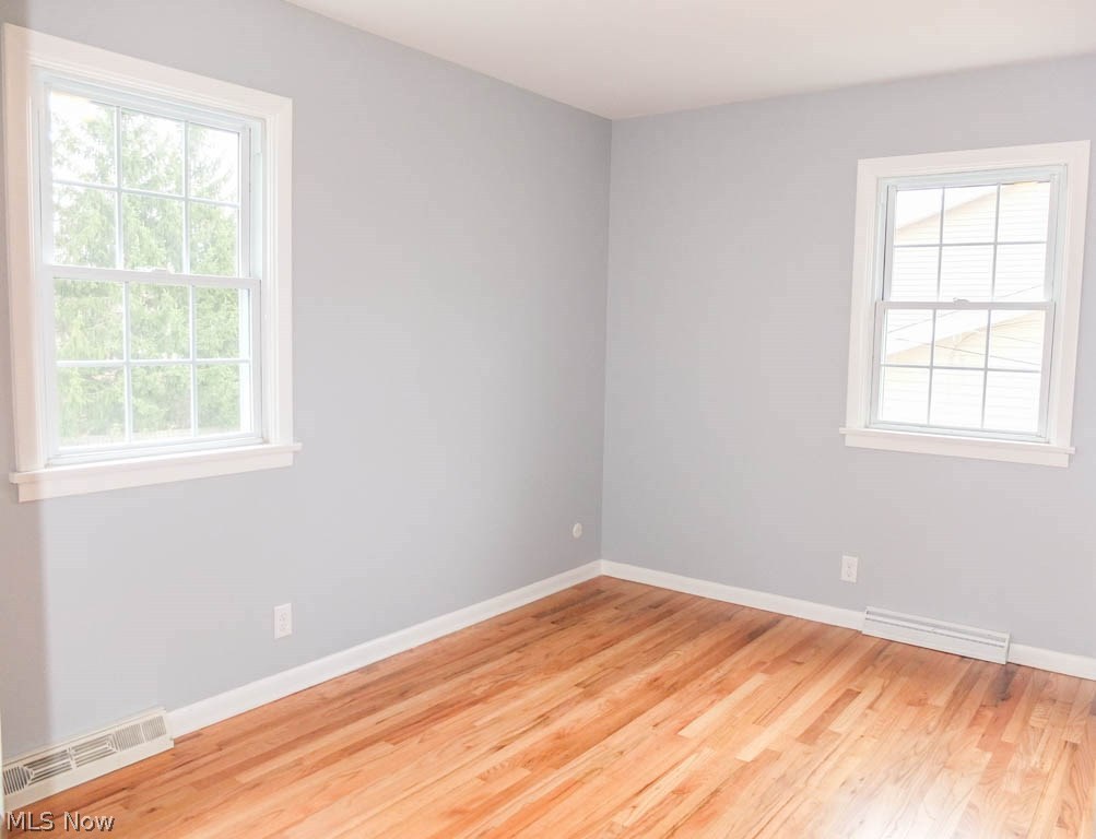 421 Holliston Road Akron, OH 44333 - Photo 12 of 22 Bedroom 2 with wood flooring.