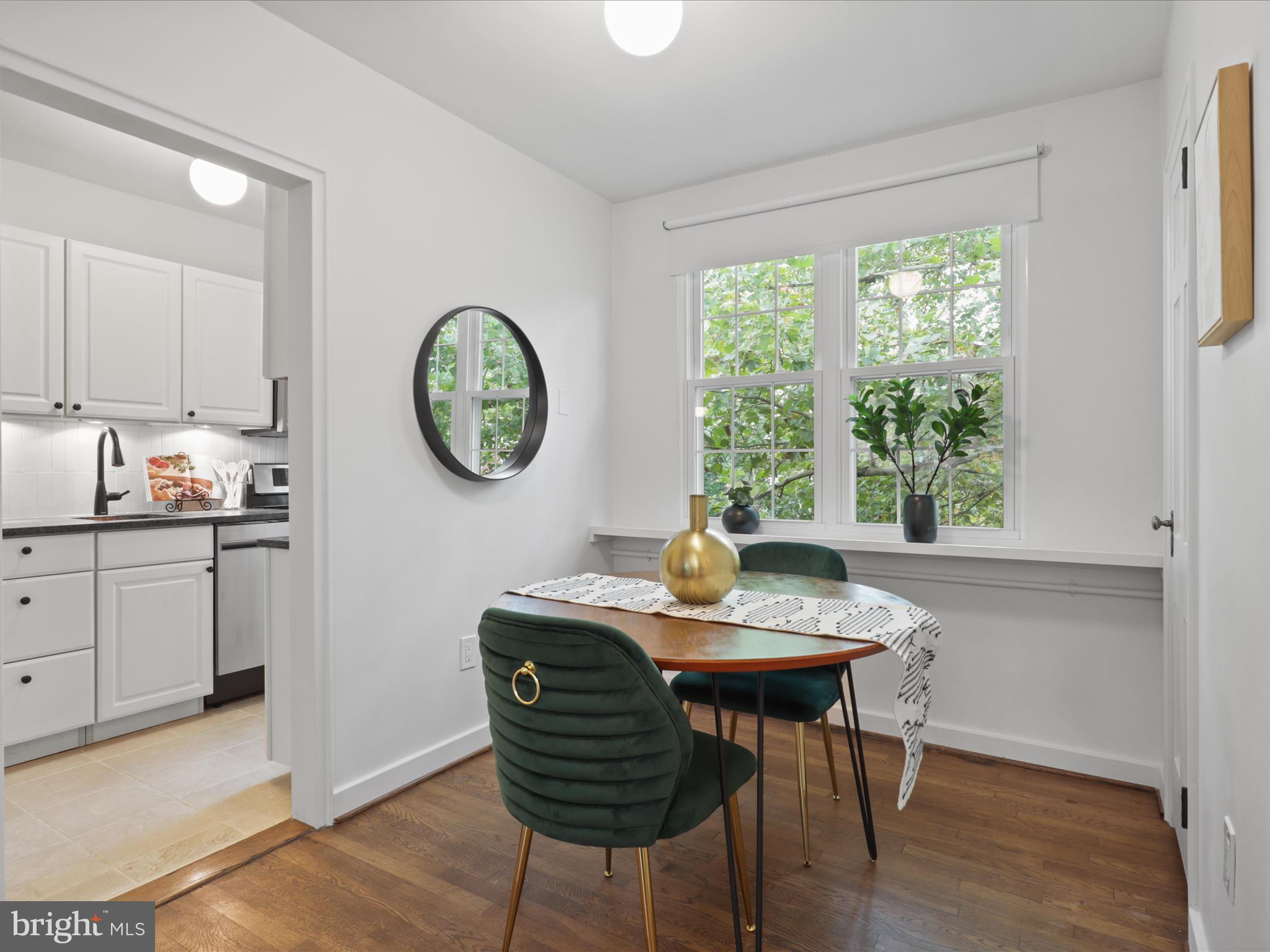 9 East Glebe Road, Unit C Alexandria, VA 22305 - Photo 11 of 38 a view of a dining room with furniture and window