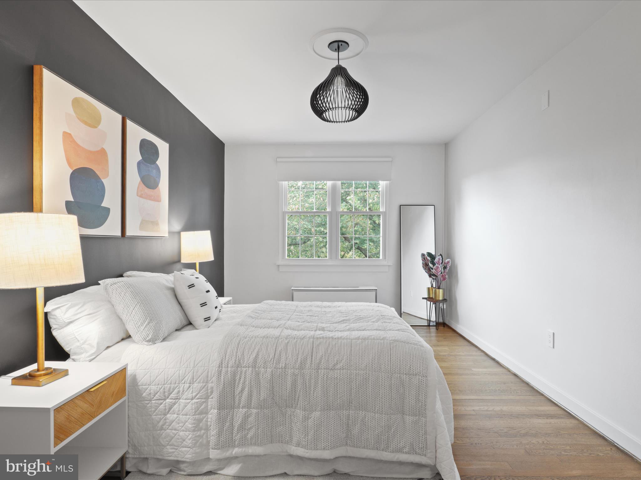 9 East Glebe Road, Unit C Alexandria, VA 22305 - Photo 21 of 38 a bedroom with a bed and a window