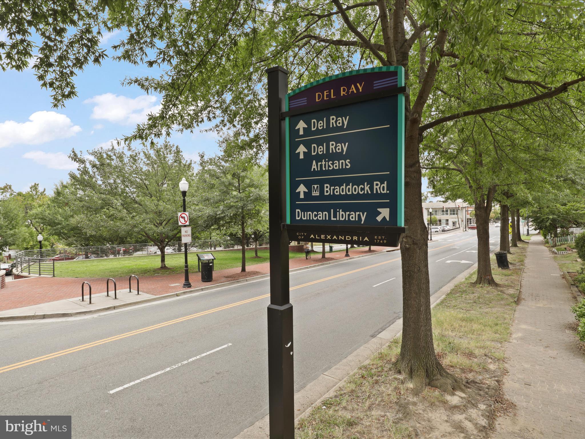 9 East Glebe Road, Unit C Alexandria, VA 22305 - Photo 28 of 38 a view of a street with benches in the middle