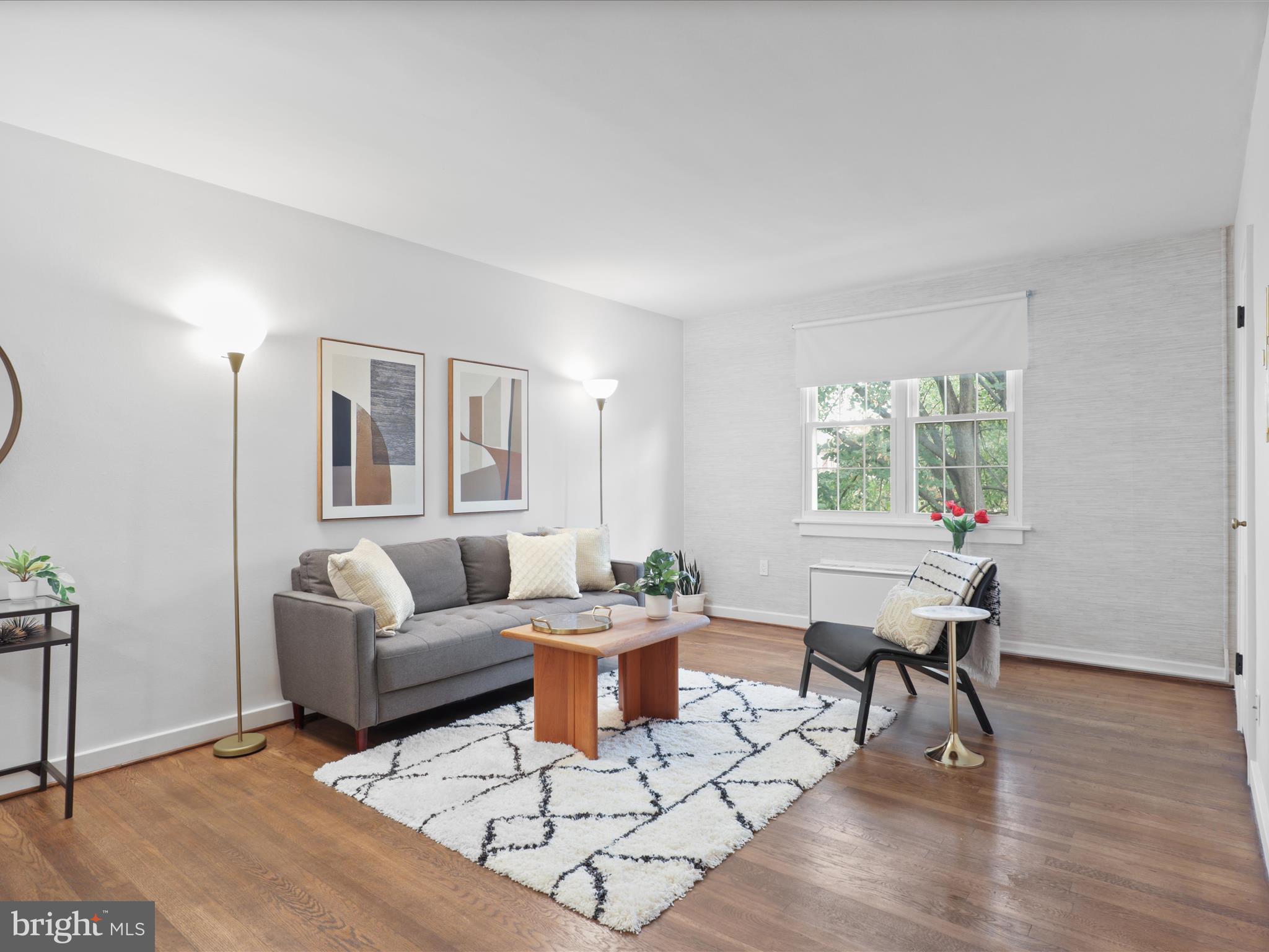 9 East Glebe Road, Unit C Alexandria, VA 22305 - Photo 8 of 38 a living room with furniture and a window