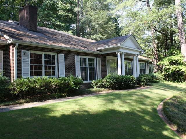 105 Bass Avenue Rome, GA 30165 - Photo 1 of 1 a view of a house with garden and yard