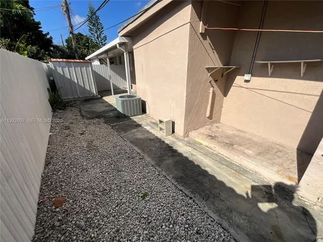 a view of a back yard of the house