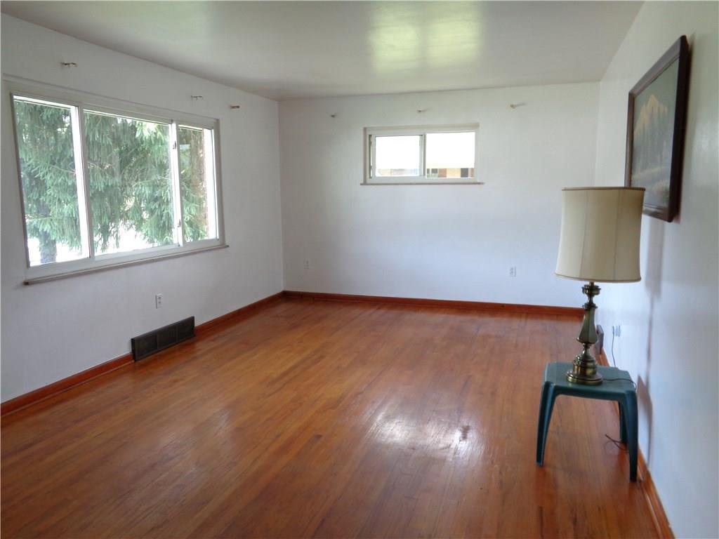 6270 Claridge Export Road Claridge, PA 15623 - Photo 3 of 18 Large, bright living room with fantastic hardwood floors